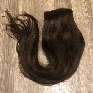 Medium brown human hair pony tail